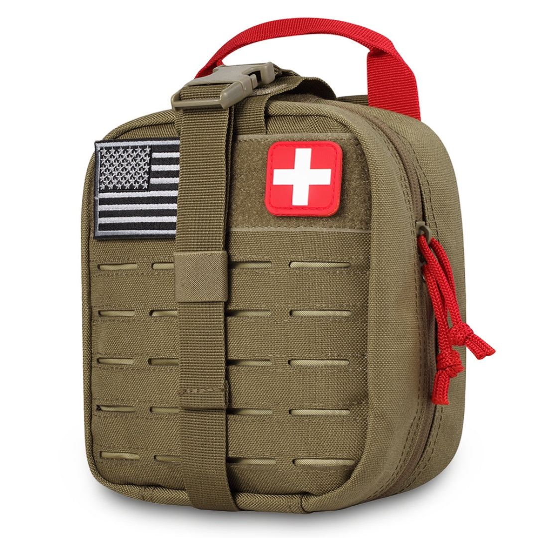 brown trauma kit with American flag and red cross patch on a white background