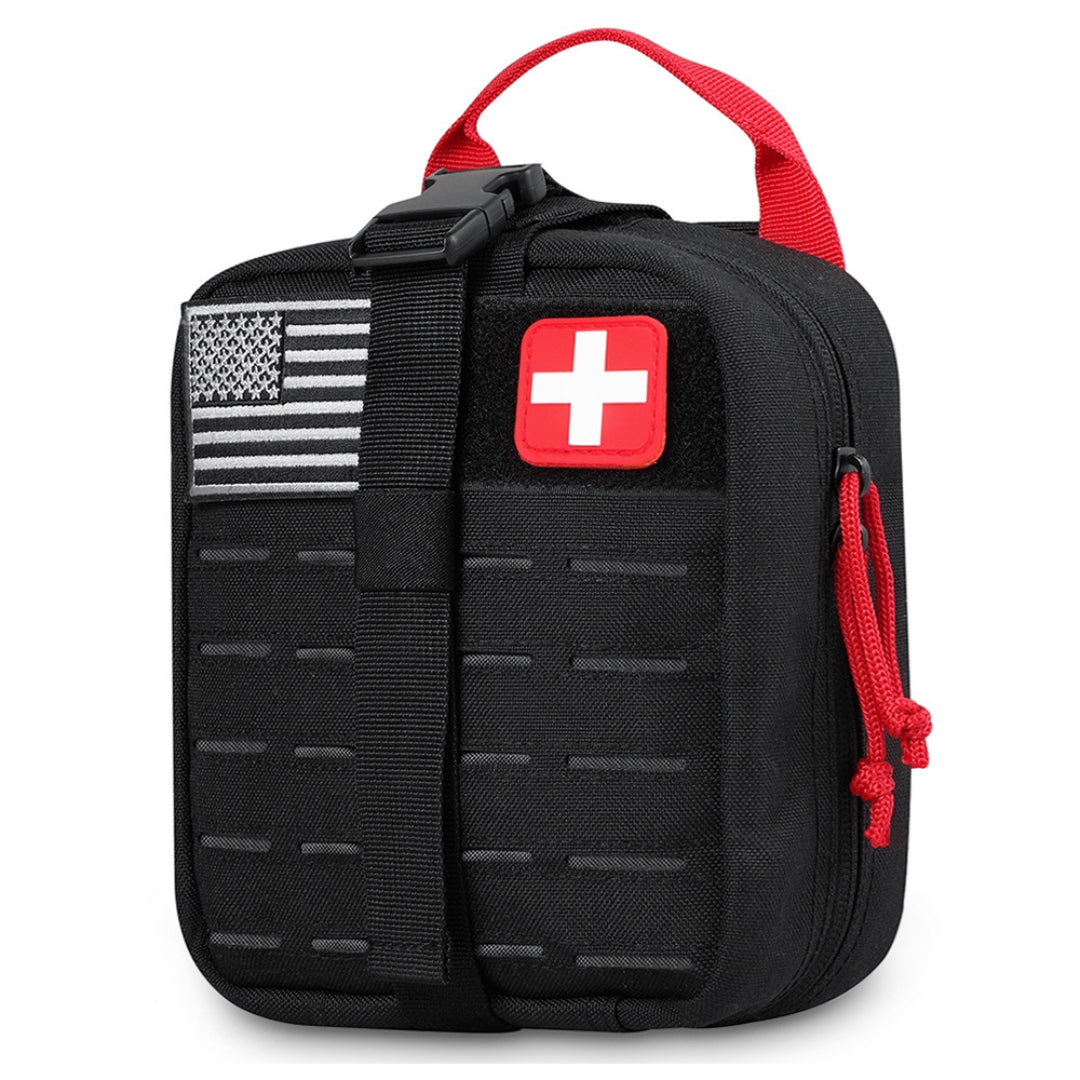 Black trauma kit with American flag and red cross patch on a white background