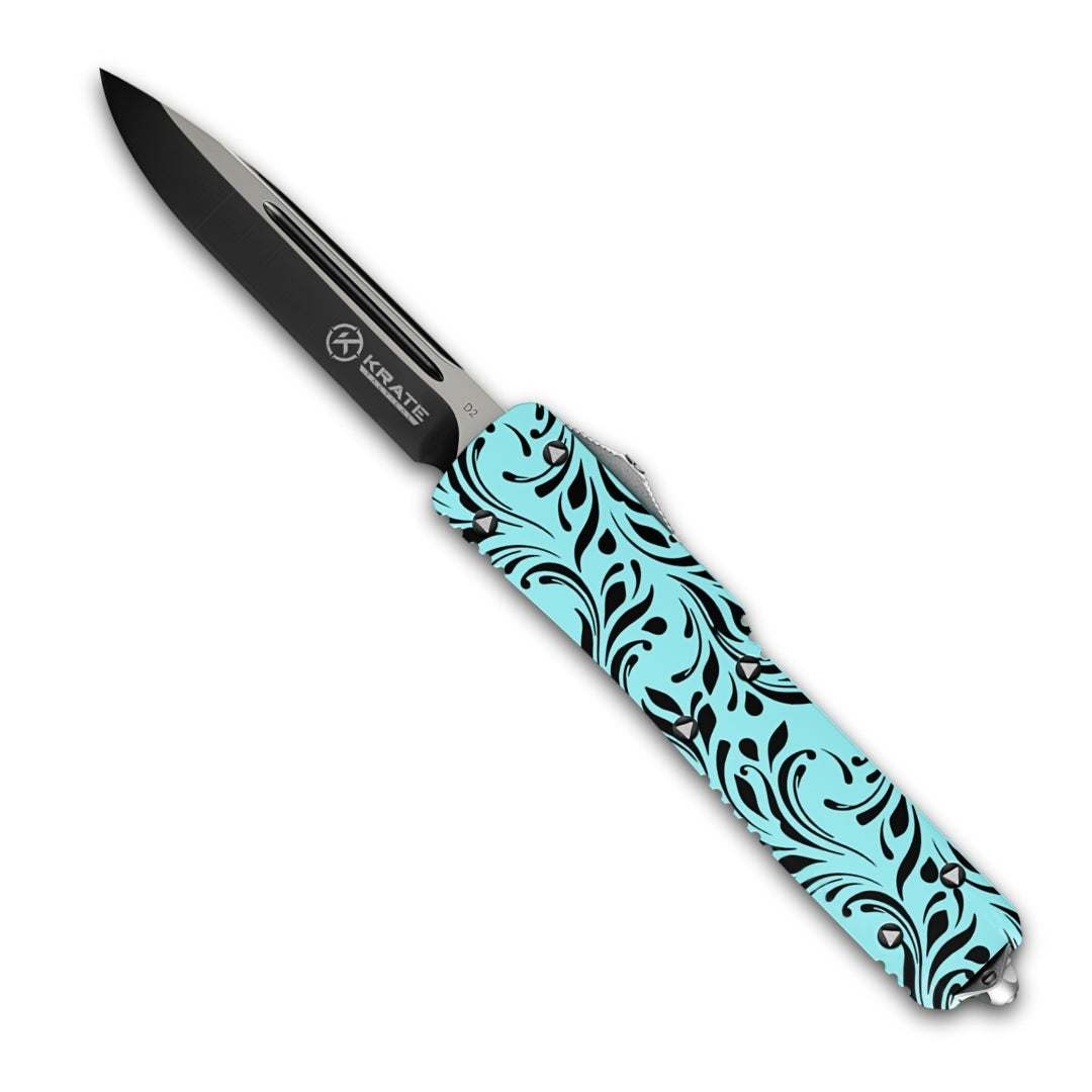 serenity otf knife with blue and black paisley design