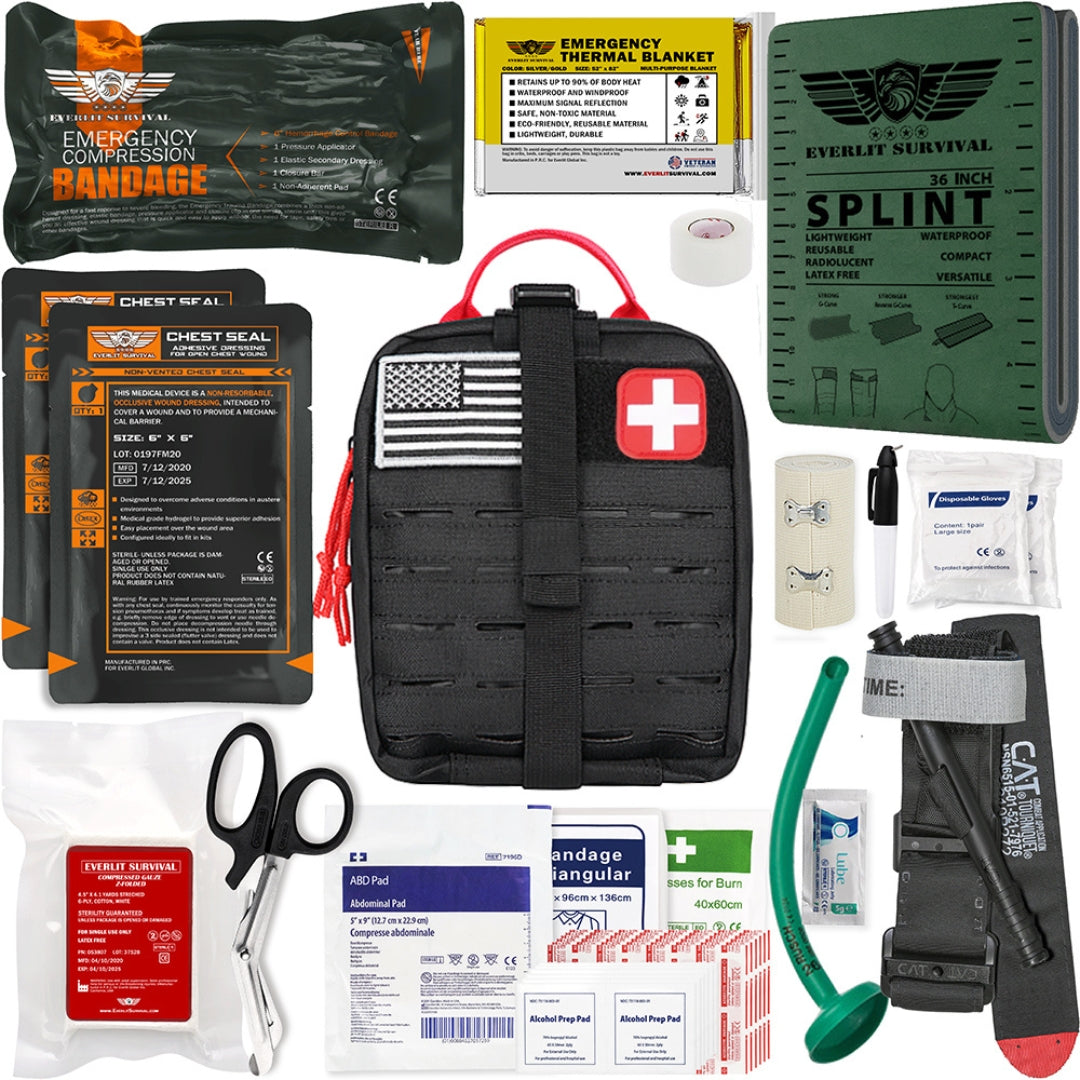 Contents of advanced trauma kit including a splint, bandages, and a first aid kit on a white background.