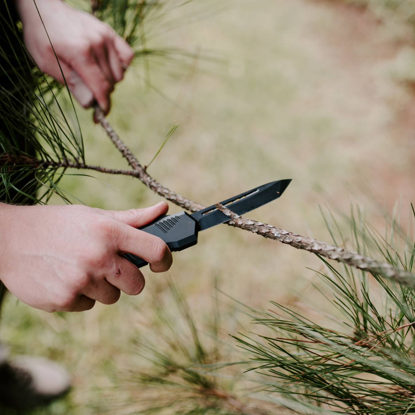 krt monarch large otf knife cutting branch